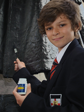 Secondary school pupil applying SmartWater to a war memorial © Duncan Soar Photography, 2012