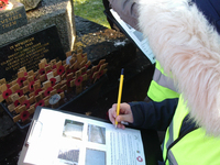 Year 5/6 pupil from Cockshutt CofE Primary School carrying out condition survey for Cockshutt war memorial © War Memorials Trust, 2019