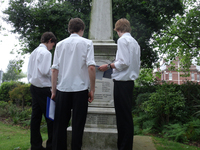 Students from Portsmouth Grammar School studying a local war memorial © S Lemieux, 2012